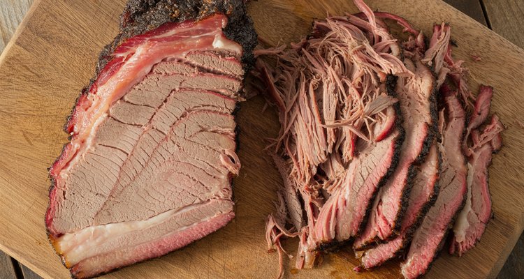 Common brisket slicing mistakes showing improper cutting technique that leads to dry tough meat