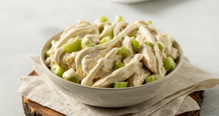 How to Make Chicken Salad Easy Creamy chicken salad with celery in a white bowl